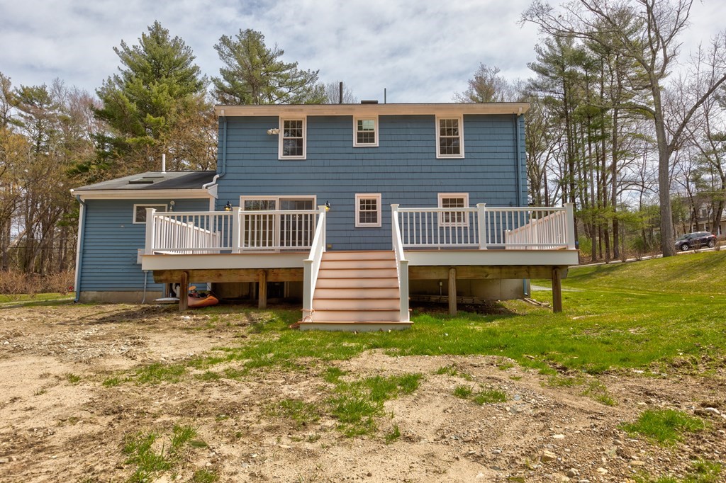 9 Picardy Lane Dover, MA 02030 - Photo 13 of 14 a view of a house with a yard