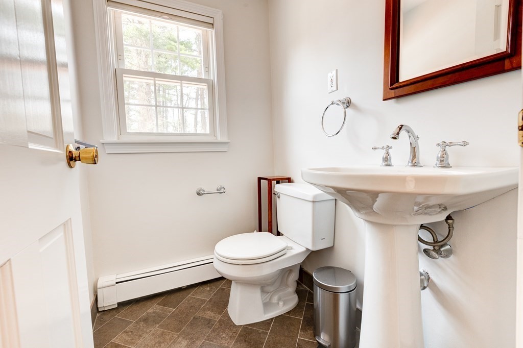9 Picardy Lane Dover, MA 02030 - Photo 7 of 14 a bathroom with a sink toilet and a mirror