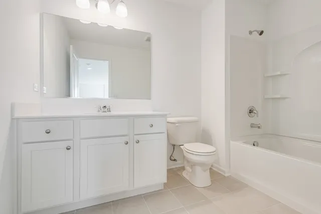 a bathroom with a toilet sink and a bathtub