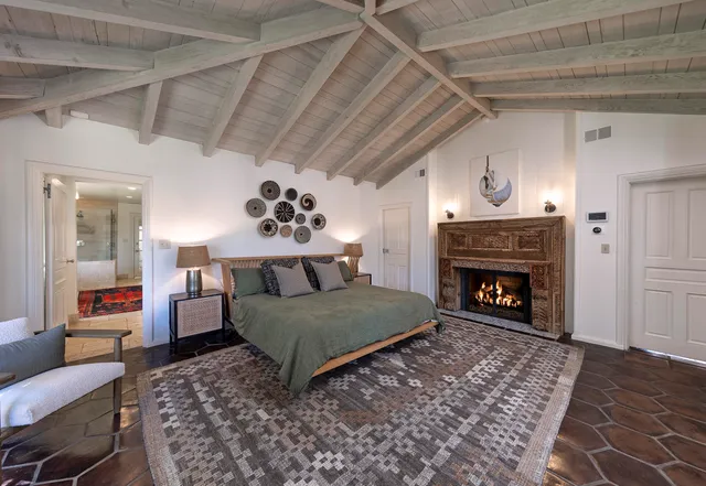 a bed room with a bed and a window