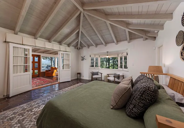 a spacious bathroom with a sink and a bathtub