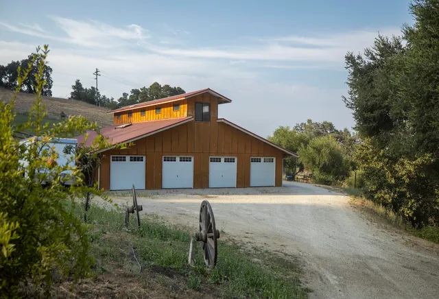 a view of a house with a mountain in the background