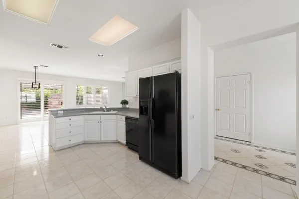 a workspace with furniture and a window