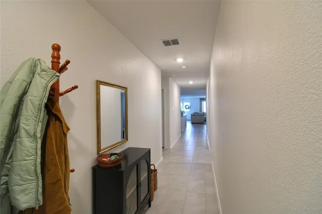 a bathroom with a sink a vanity and a mirror