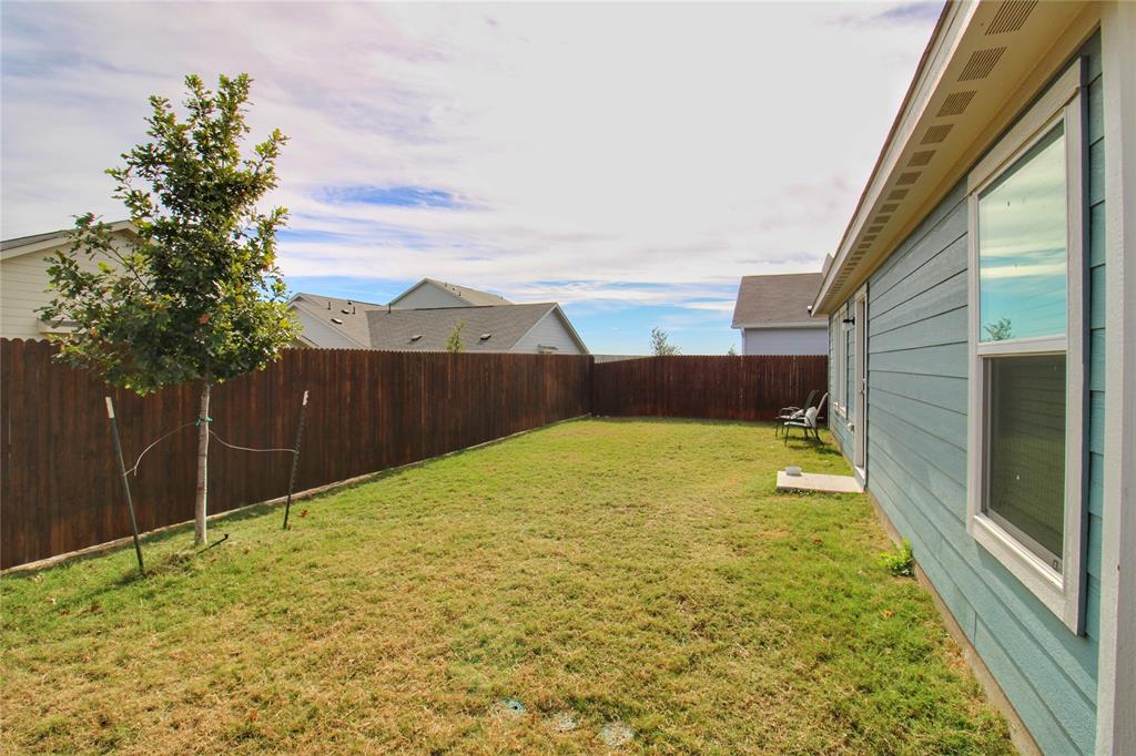 11740 Marcellus Way Rhome, TX 76078 - Photo 29 of 33 a view of a backyard