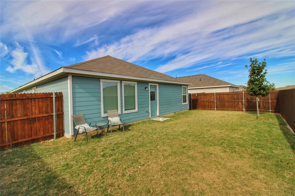 11740 Marcellus Way Rhome, TX 76078 - Photo 30 of 33 a house with a outdoor space