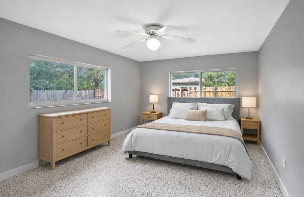 1571 Riverland Road Fort Lauderdale, FL 33312 - Photo 12 of 25 a bedroom with a bed and a dresser