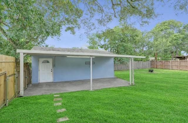 1571 Riverland Road Fort Lauderdale, FL 33312 - Photo 19 of 25 a view of a house with a backyard