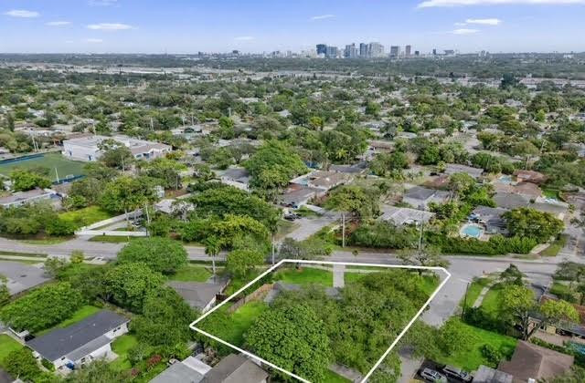 1571 Riverland Road Fort Lauderdale, FL 33312 - Photo 2 of 25 an aerial view of residential houses with outdoor space and trees