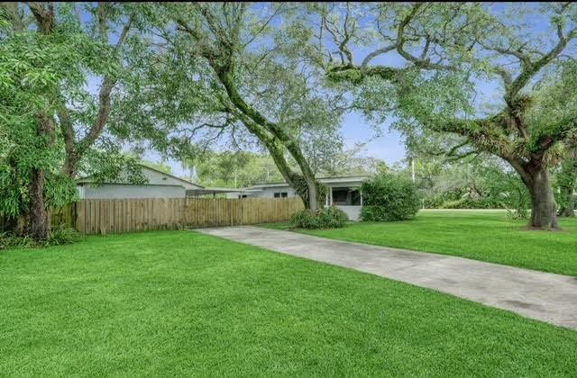 1571 Riverland Road Fort Lauderdale, FL 33312 - Photo 23 of 25 a view of a yard with a tree
