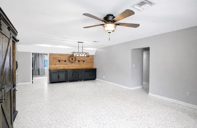 1571 Riverland Road Fort Lauderdale, FL 33312 - Photo 4 of 25 a view of a kitchen with a sink and a refrigerator