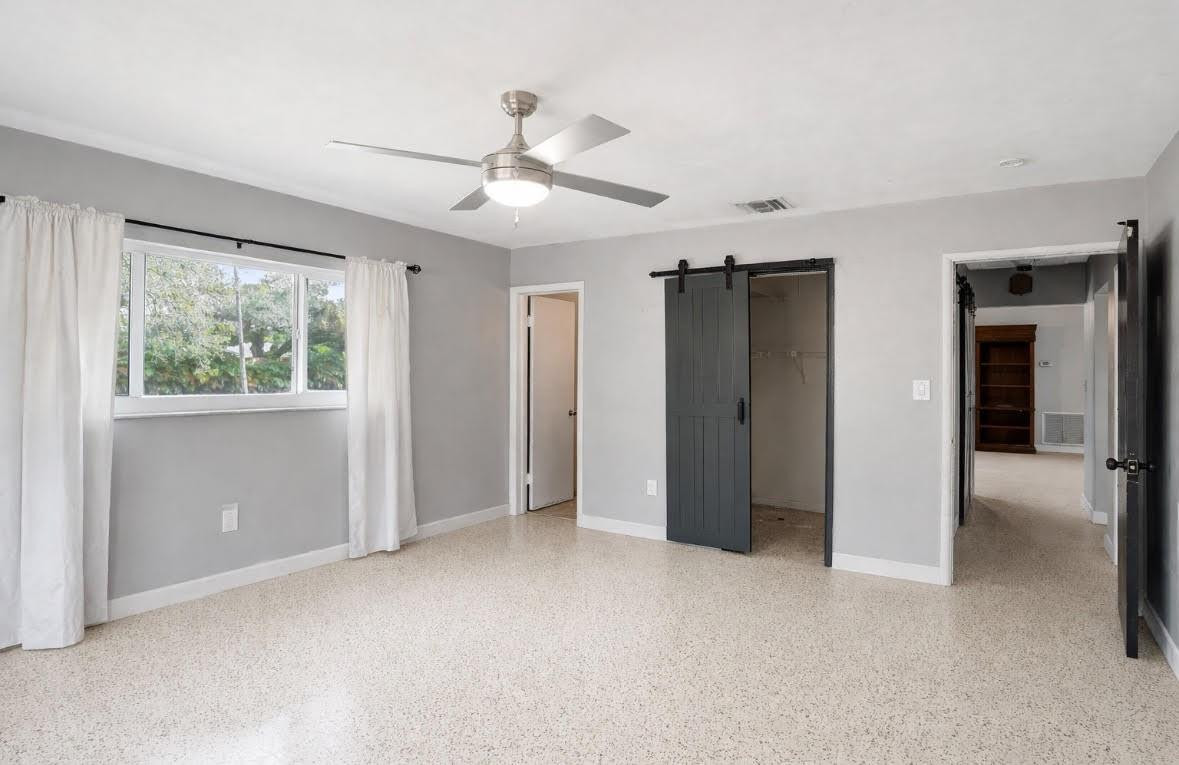 1571 Riverland Road Fort Lauderdale, FL 33312 - Photo 9 of 25 a view of an empty room with a window