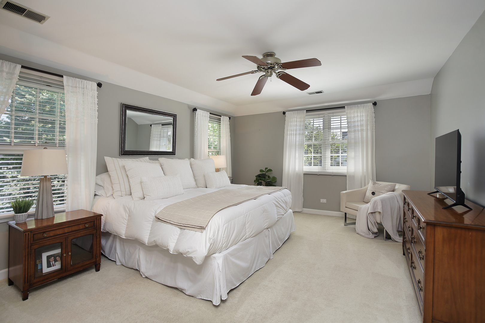 2224 Crabtree Lane Northbrook, IL 60062 - Photo 12 of 34 a bedroom with a bed and a flat screen tv