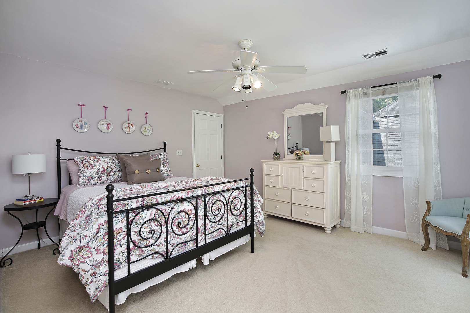 2224 Crabtree Lane Northbrook, IL 60062 - Photo 15 of 34 a bedroom with bed and a chandelier