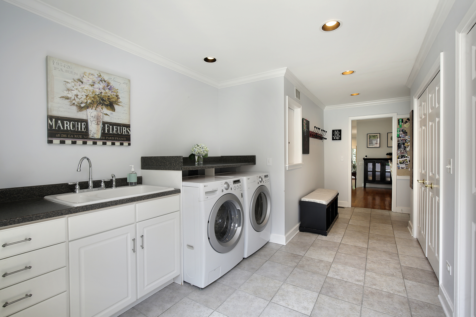 2224 Crabtree Lane Northbrook, IL 60062 - Photo 21 of 34 a view of a hallway with washer and dryer