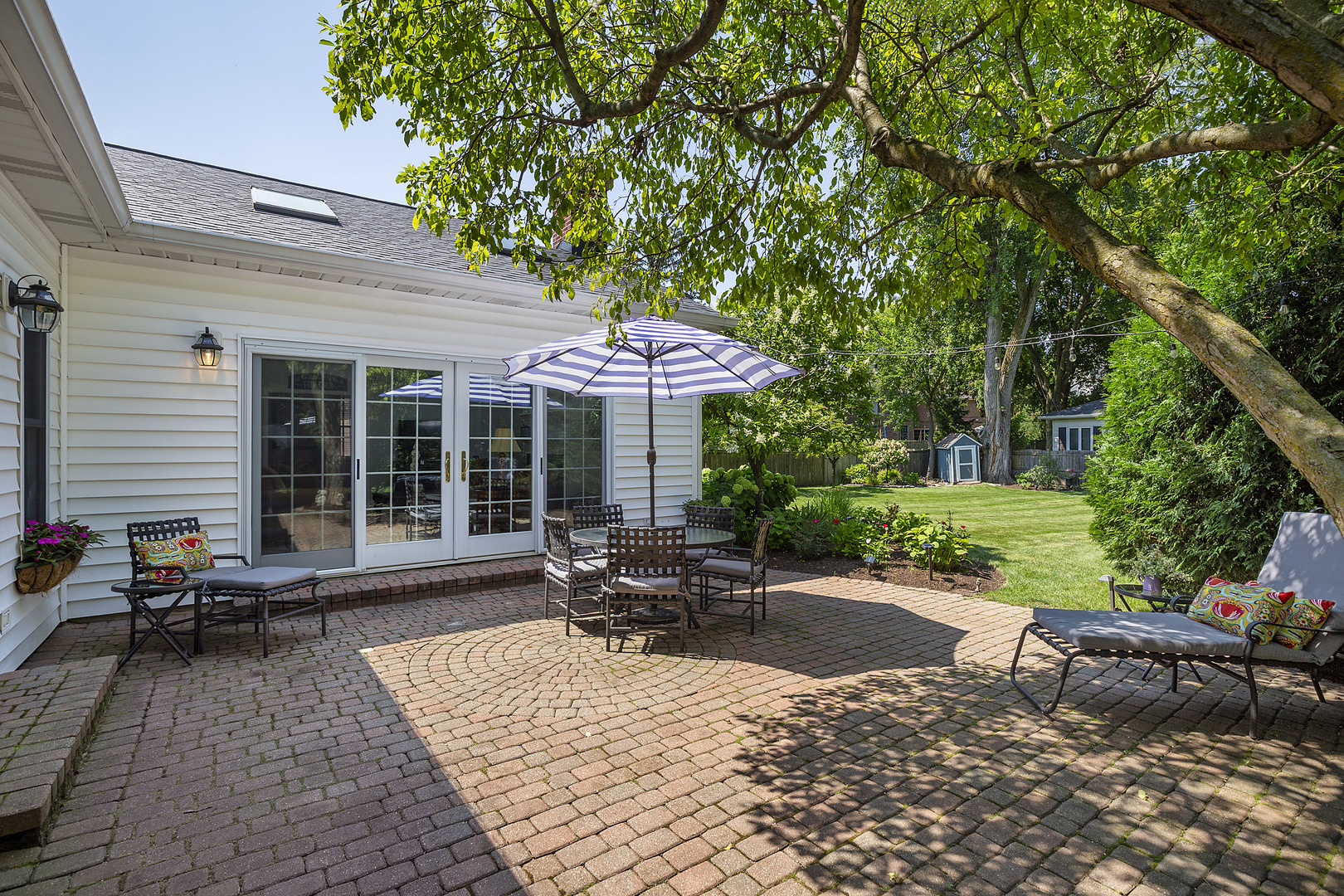 2224 Crabtree Lane Northbrook, IL 60062 - Photo 24 of 34 a view of a house with backyard sitting area and garden