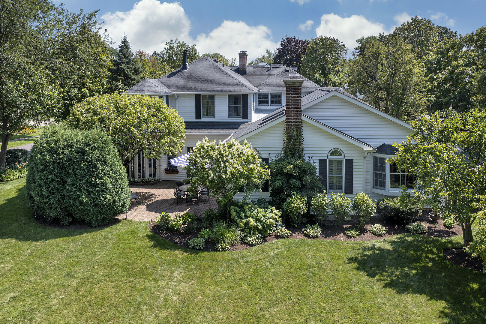 2224 Crabtree Lane Northbrook, IL 60062 - Photo 25 of 34 a front view of a house with a yard