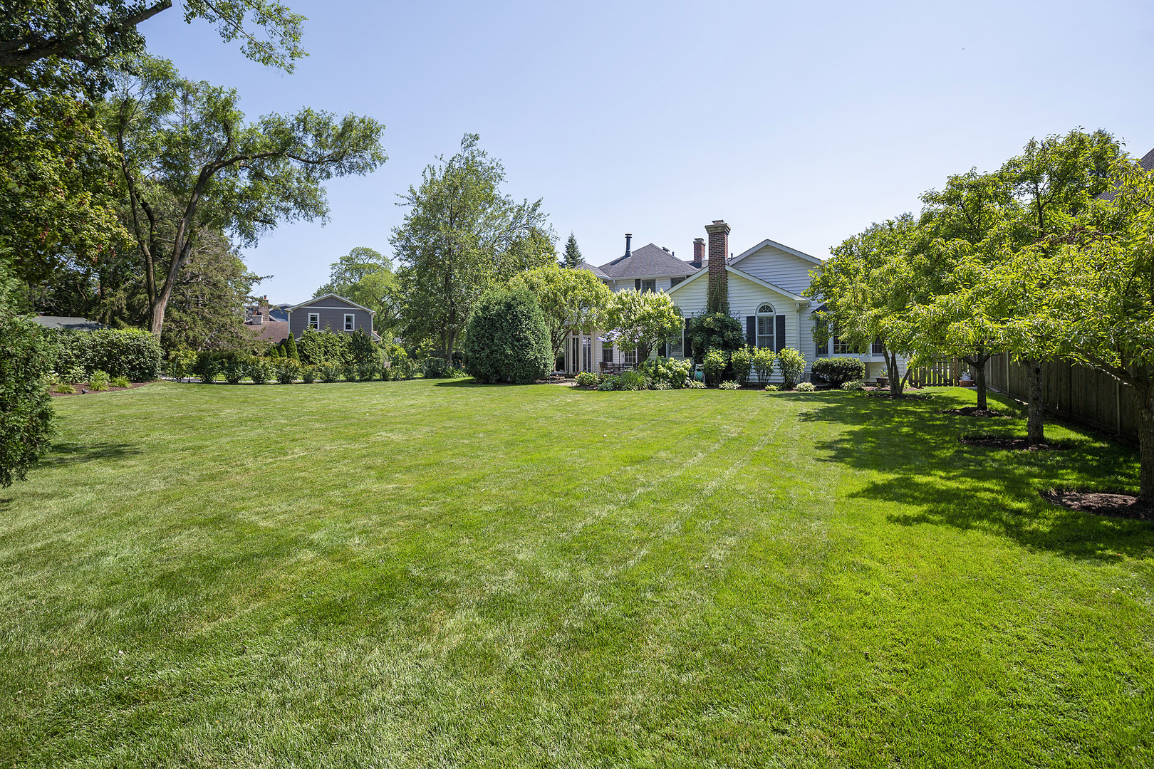 2224 Crabtree Lane Northbrook, IL 60062 - Photo 26 of 34 a view of a green field with trees in the background