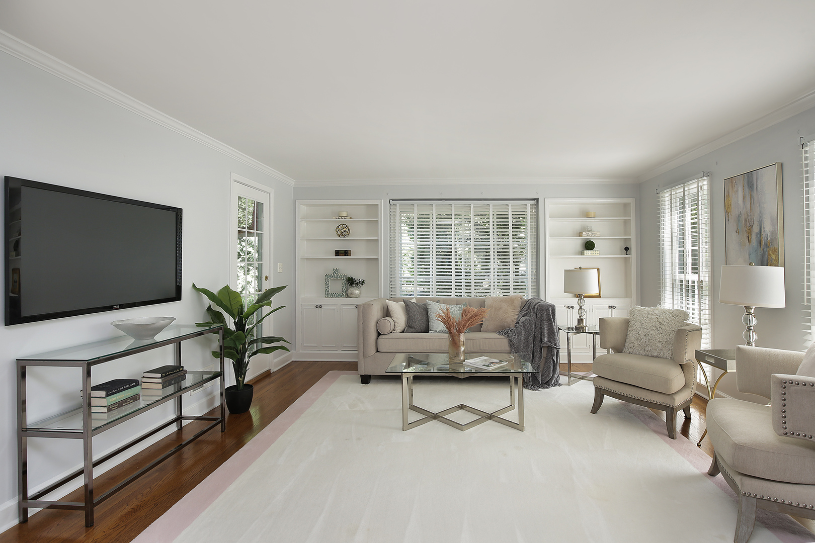 2224 Crabtree Lane Northbrook, IL 60062 - Photo 3 of 34 a living room with furniture and a flat screen tv