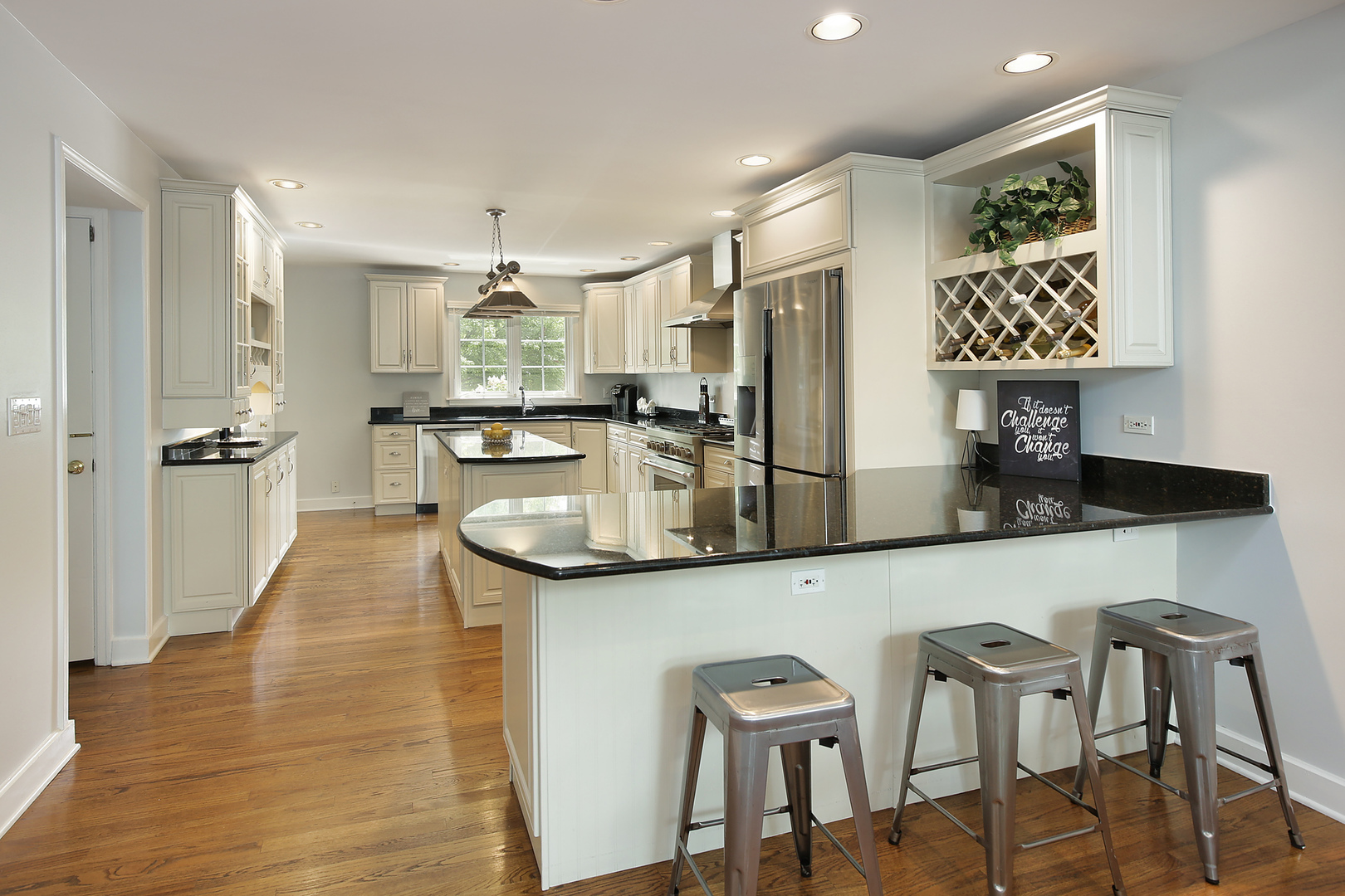 2224 Crabtree Lane Northbrook, IL 60062 - Photo 6 of 34 a kitchen with stainless steel appliances granite countertop a sink and a refrigerator