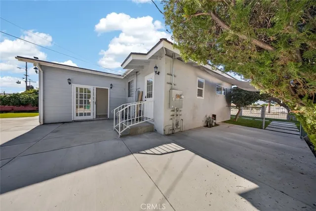 a view of a backyard with a garden and plants