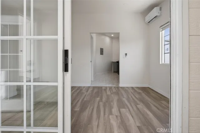 a kitchen with stove top oven and cabinets