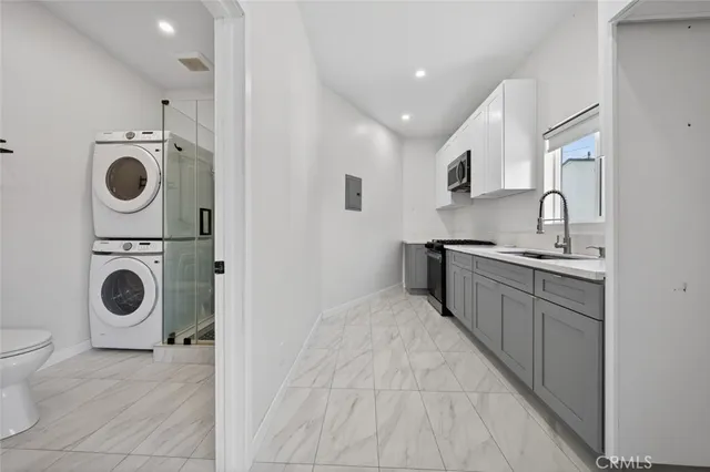a bathroom with a toilet and a sink