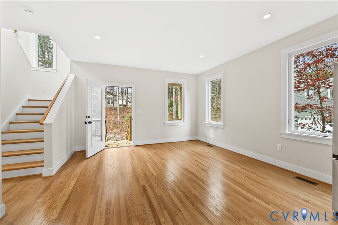 34 Turkeysag Trail Palmyra, VA 22963 - Photo 11 of 44 a view of an empty room with wooden floor and a window
