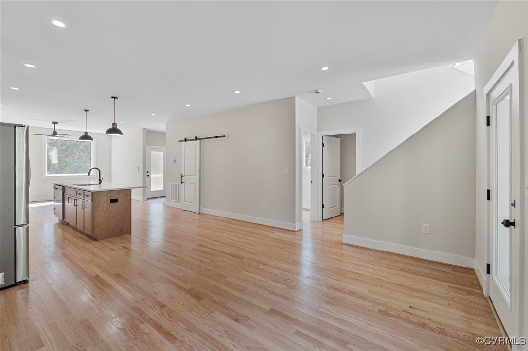 34 Turkeysag Trail Palmyra, VA 22963 - Photo 12 of 44 a big room with wooden floor and windows