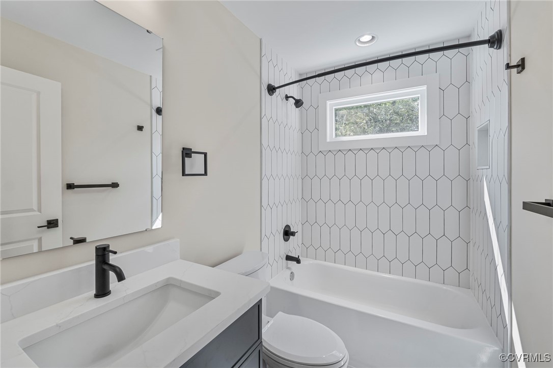 34 Turkeysag Trail Palmyra, VA 22963 - Photo 18 of 44 a bathroom with a granite countertop sink toilet and bathtub