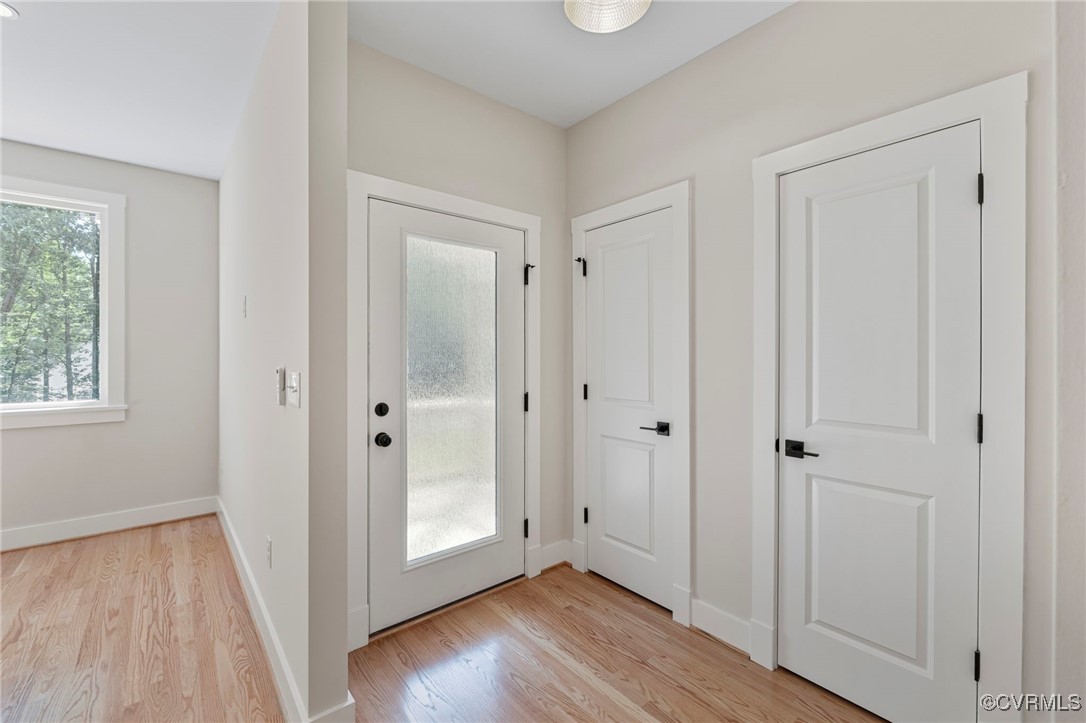 34 Turkeysag Trail Palmyra, VA 22963 - Photo 2 of 44 a view of a hallway with wooden floor