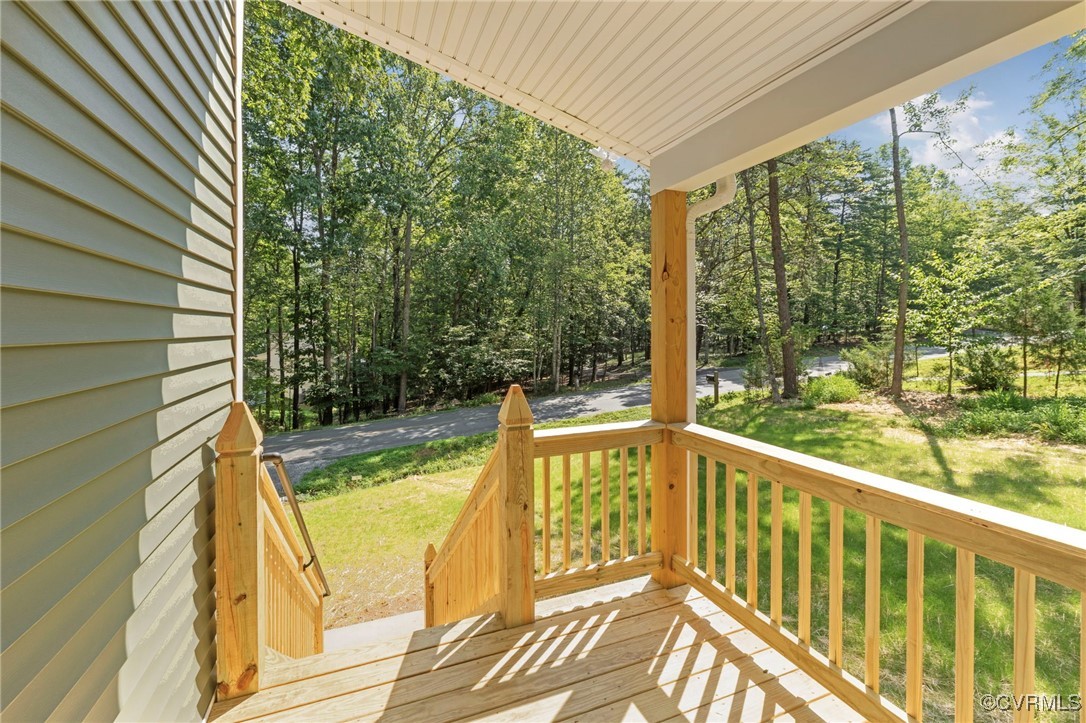 34 Turkeysag Trail Palmyra, VA 22963 - Photo 33 of 44 Wooden porch with a lawn and view of scattered tre