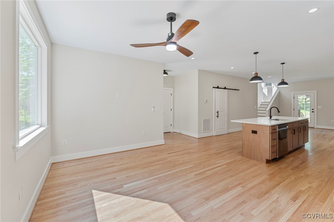 34 Turkeysag Trail Palmyra, VA 22963 - Photo 5 of 44 a view of a kitchen with a sink and wooden floor