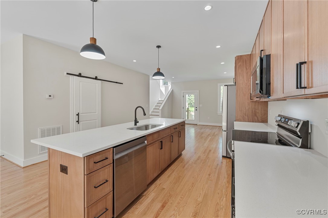 34 Turkeysag Trail Palmyra, VA 22963 - Photo 7 of 44 a large white kitchen with a large island oven a sink stainless steel appliances and cabinets