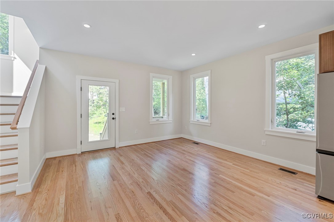 34 Turkeysag Trail Palmyra, VA 22963 - Photo 10 of 44 an empty room with wooden floor and windows