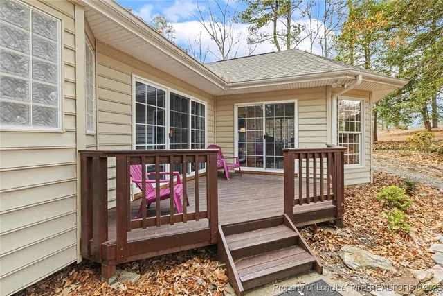 a front view of a house with large windows
