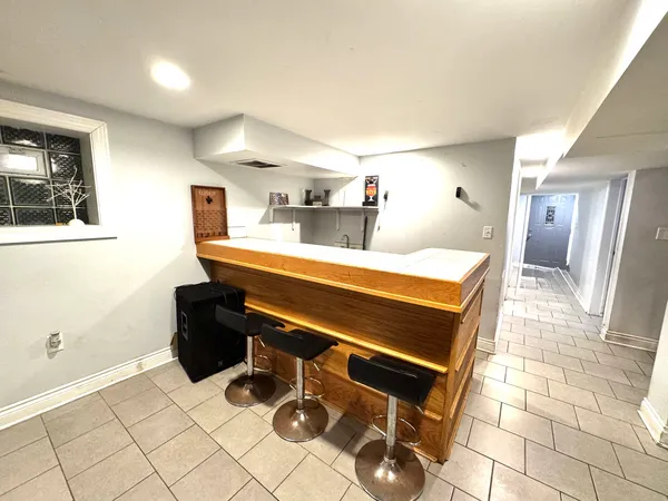 a room with a table and chairs
