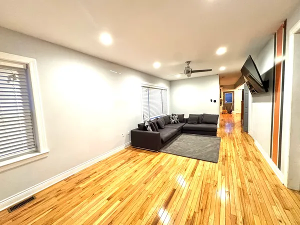 a bed room with a bed and a view of bedroom