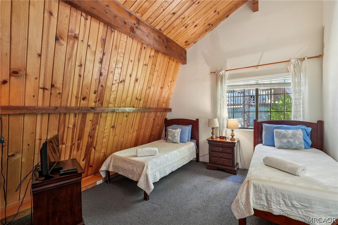 2409 Spring Oak Drive Running Springs, CA 92382 - Photo 15 of 24 a bedroom with furniture and a window