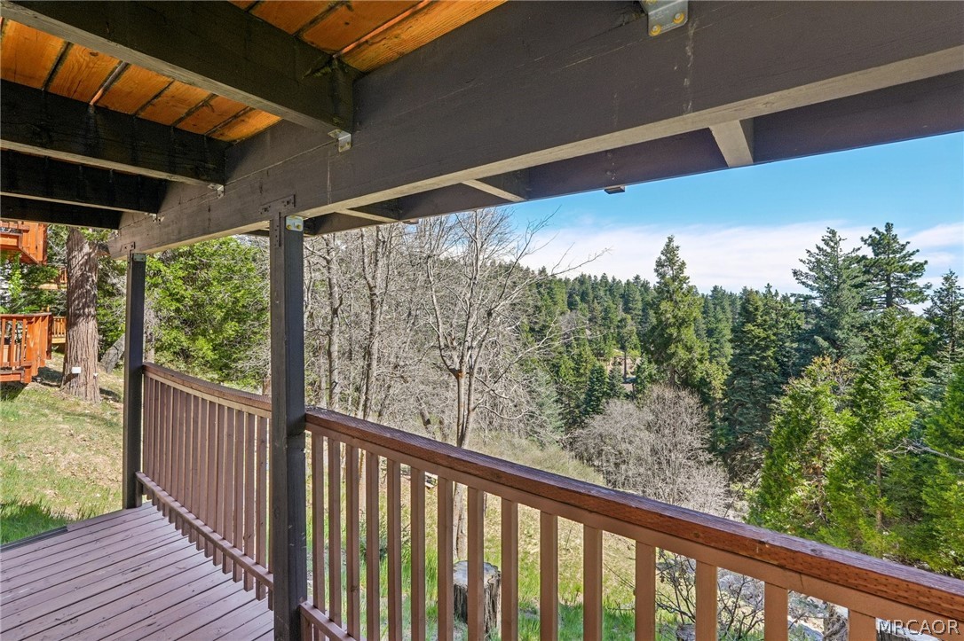 2409 Spring Oak Drive Running Springs, CA 92382 - Photo 21 of 24 a view of a balcony with wooden floor