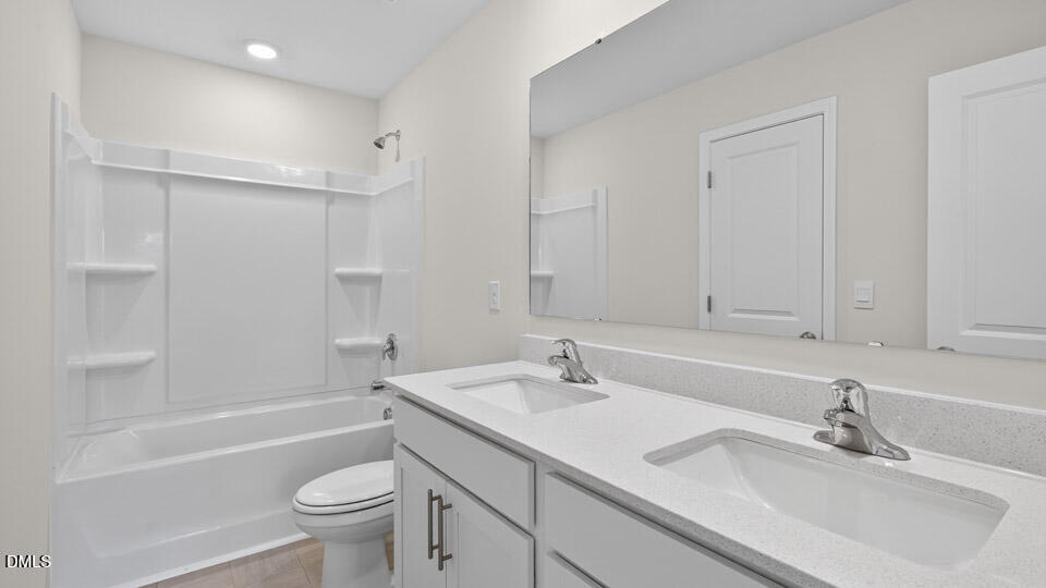 189 Calebs Cor Place Spring Lake, NC 28390 - Photo 29 of 42 a bathroom with a sink double vanity granite toilet tub and shower