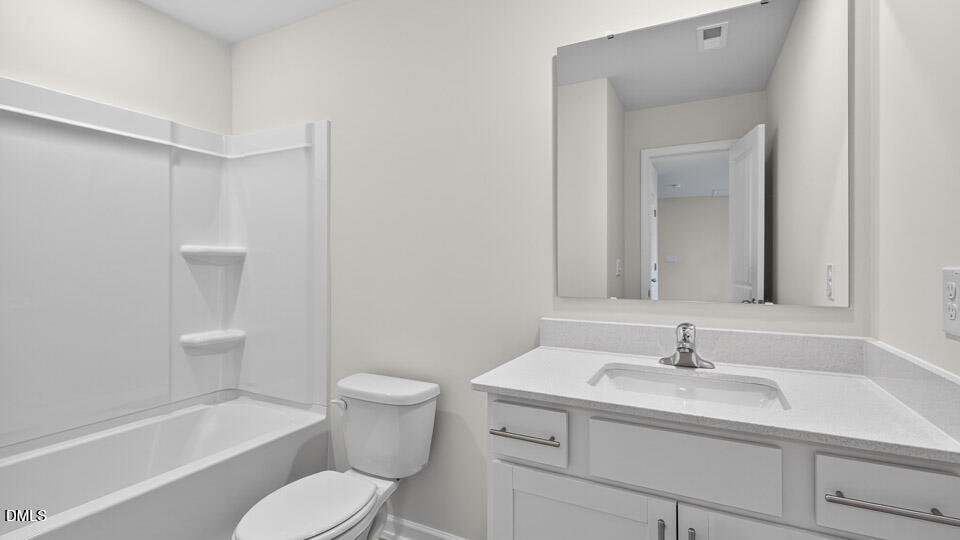 189 Calebs Cor Place Spring Lake, NC 28390 - Photo 30 of 42 a bathroom with a sink toilet vanity and bathtub