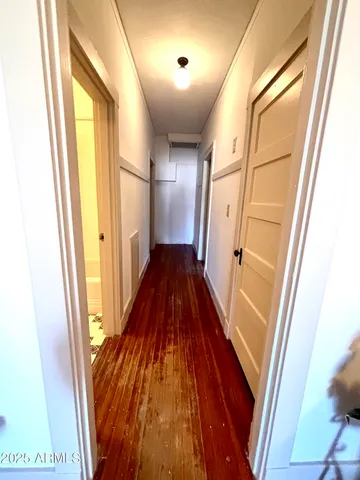 a kitchen with a sink cabinets and window