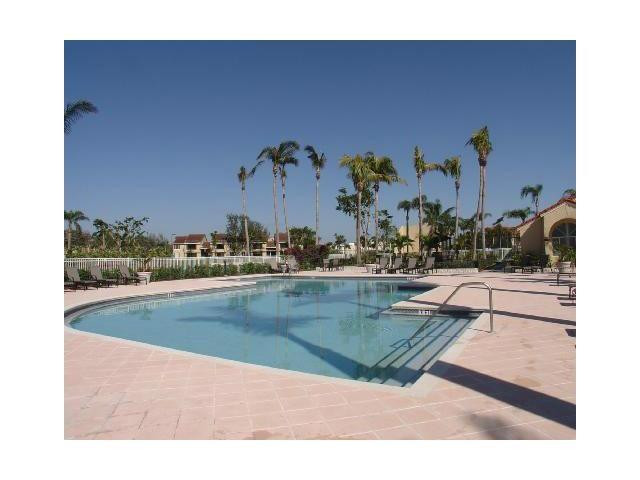 621 Lyons Road, Unit 9101 Coconut Creek, FL 33063 - Photo 12 of 21 a view of swimming pool