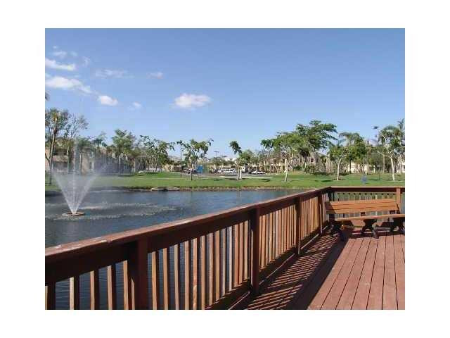 621 Lyons Road, Unit 9101 Coconut Creek, FL 33063 - Photo 7 of 21 a view of balcony with outdoor space