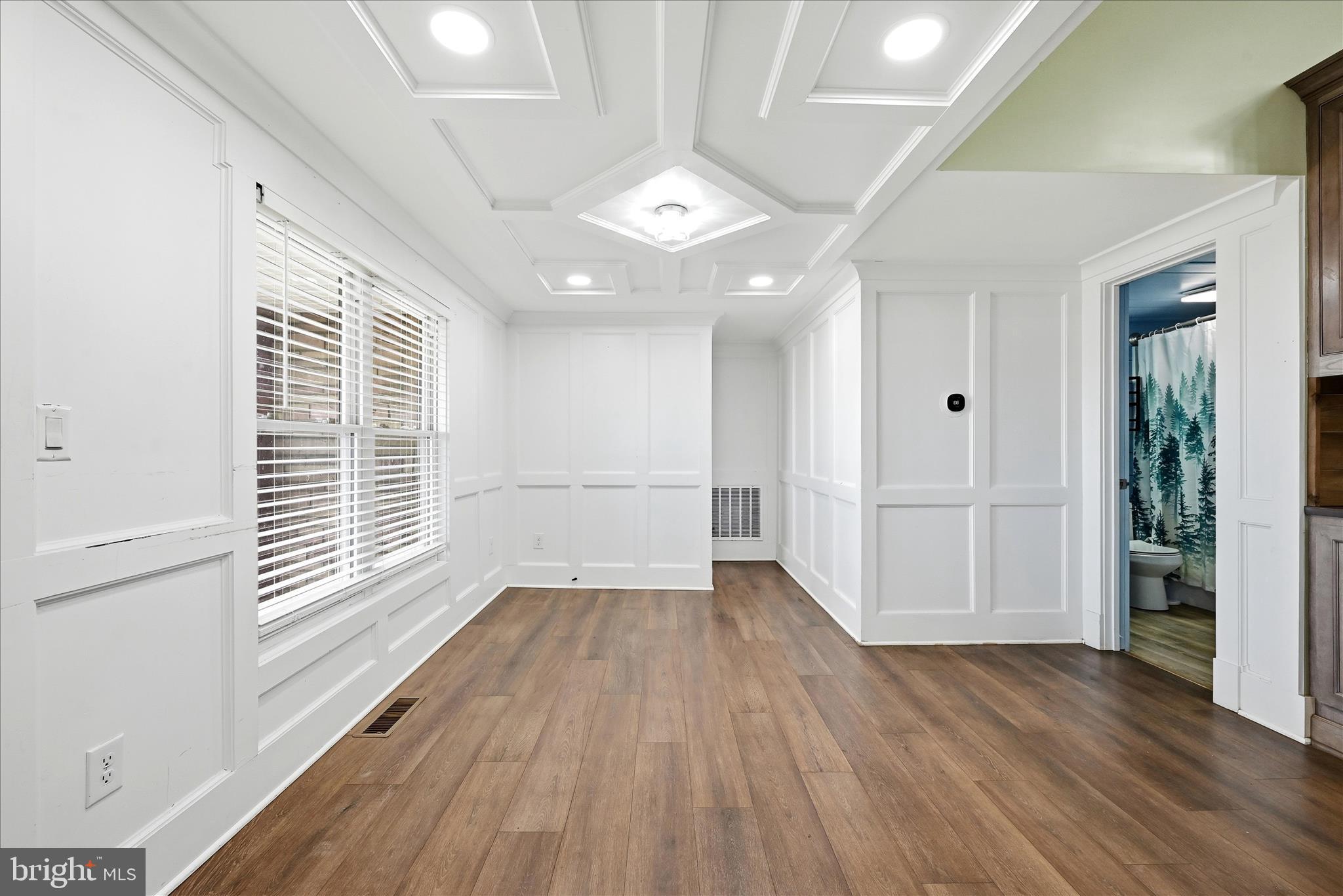 147 West Duck Street Front Royal, VA 22630 - Photo 13 of 36 wooden floor in an empty room with a window