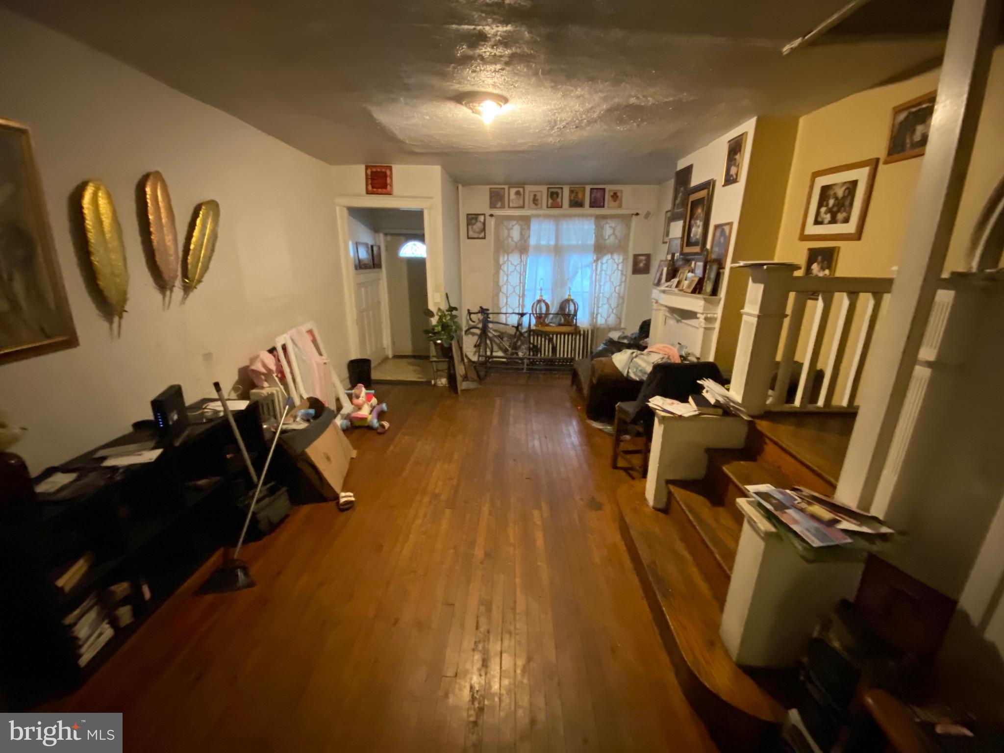 5336 Race Street Philadelphia, PA 19139 - Photo 7 of 23 a living room with furniture pool table and a flat screen tv