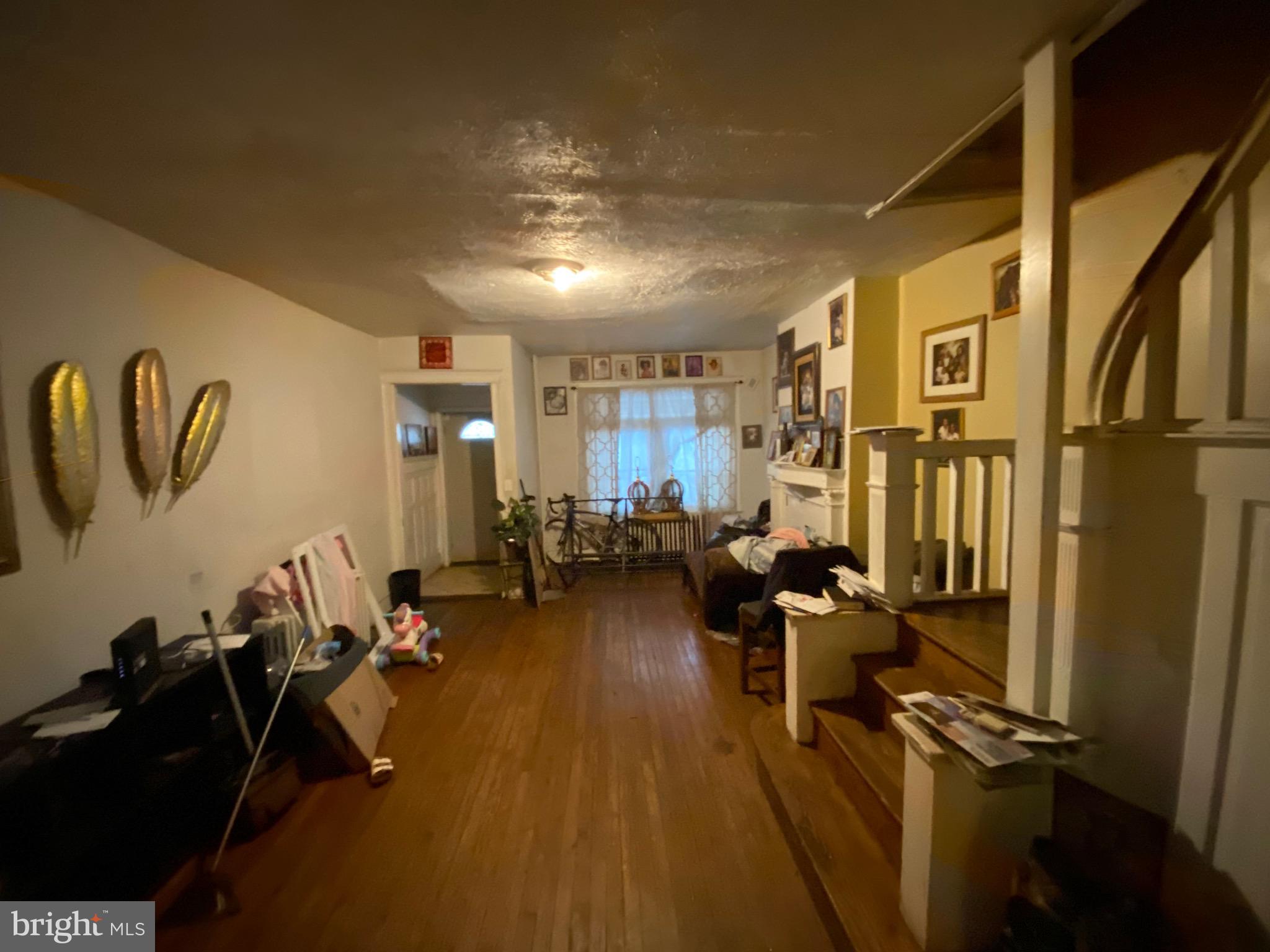 5336 Race Street Philadelphia, PA 19139 - Photo 8 of 23 a gym room with lots of residential furniture