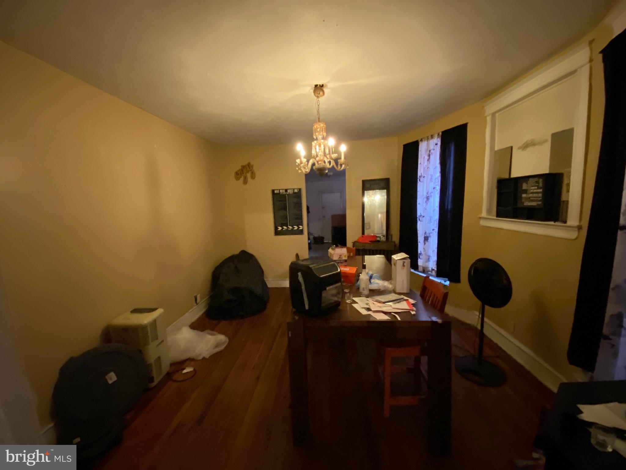 5336 Race Street Philadelphia, PA 19139 - Photo 9 of 23 a bedroom with a bed window and mirror