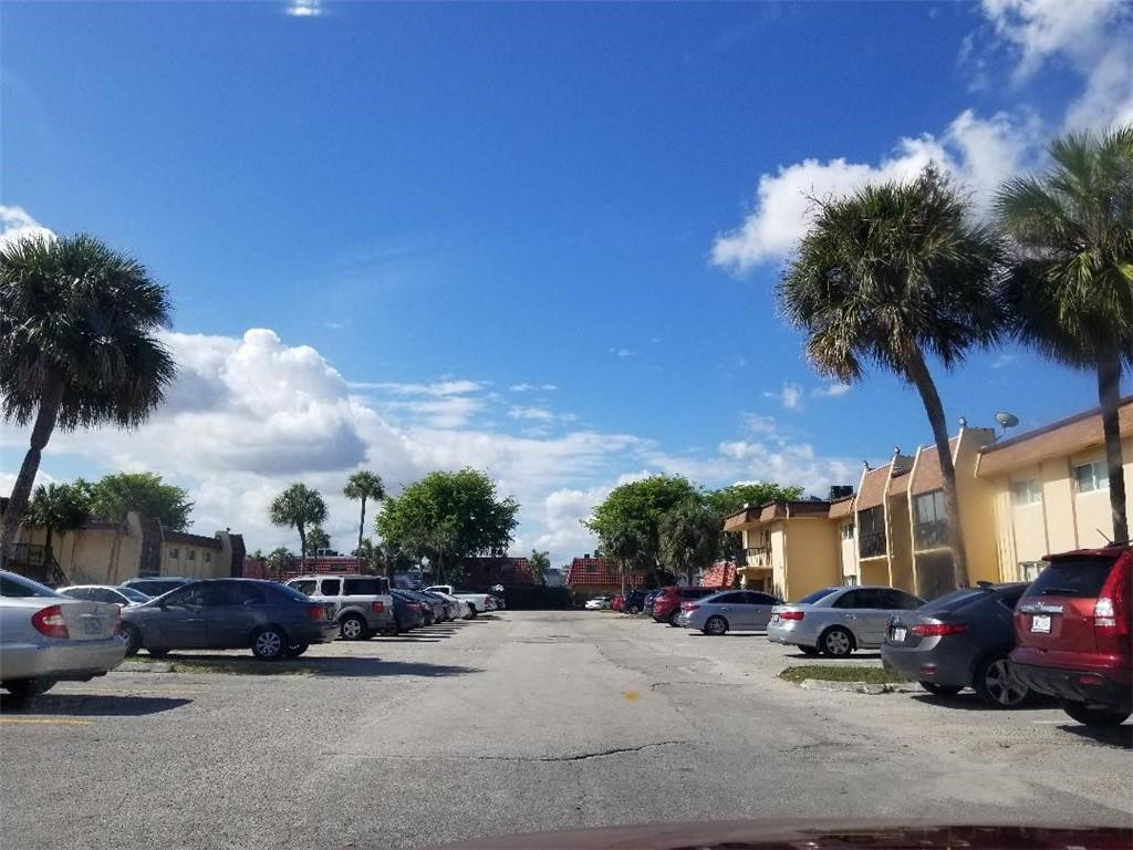 2874 Northwest 55th Avenue, Unit 1D Lauderhill, FL 33313 - Photo 4 of 4 PARKING LOT VIEW